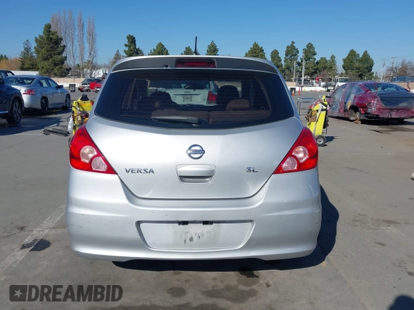 2010 Nissan Versa S with VIN 3N1BC1CP2AL377564, listed as a IAAI auction lot 41383636 with 200,798 mi miles and . Bid and sale history available at DreamBid. Image 17.