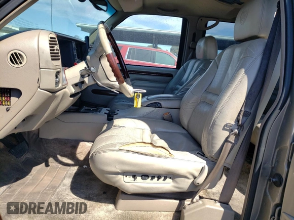 2000 Cadillac Escalade z VIN 1GYEK63R5YR187895, wystawiony jako Copart lot #72468044 z przebiegiem 189 026 mil mil oraz Czysty tytuł • Clean title. Historia ofert i sprzedaży dostępna na DreamBid. Obrazek 7.