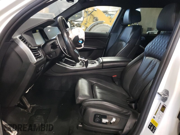 2020 BMW X5 M50i with VIN 5UXJU4C00L9C27198, listed as a Copart auction lot 76705264 with 0 mi miles and Salvage Title. Bid and sale history available at carsss.com. Image 7.