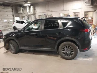 2019 Mazda CX-5 Touring with VIN JM3KFACM7K1568732, listed as a IAAI auction lot 41866736 with 50,753 mi miles. Bid and sale history available at carsss.com. Image 14.