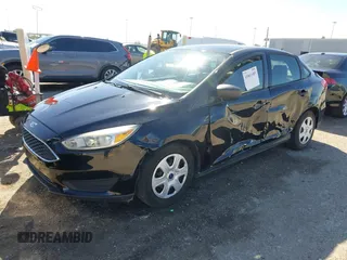 2018 Ford Focus S with VIN 1FADP3E29JL259004, listed as a IAAI auction lot 41841485 with 77,567 mi miles. Bid and sale history available at carsss.com. Image 2.