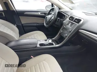2018 Ford Fusion S z VIN 3FA6P0UU0JR157005, wystawiony jako IAAI lot #41689881 z przebiegiem Nie podano mil oraz . Historia ofert i sprzedaży dostępna na DreamBid. Obrazek 5.