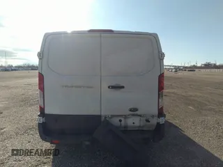 2018 Ford Transit with VIN 1FTYR2YM8JKB11512, listed as a IAAI auction lot 41594917 with 107,015 mi miles and . Bid and sale history available at DreamBid. Image 16.