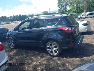 2018 Ford Escape Titanium with VIN 1FMCU9J94JUC98805, listed as a IAAI auction lot 42718214 with 36,689 mi miles and . Bid and sale history available at DreamBid. Image 14.