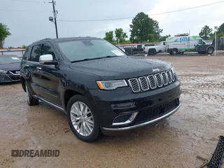 2018 Jeep Grand Cherokee Summit z VIN 1C4RJEJG9JC216605, wystawiony jako IAAI lot #42714382 z przebiegiem 134 460 mil mil oraz . Historia ofert i sprzedaży dostępna na DreamBid. Obrazek 1.