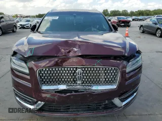 2019 Lincoln Nautilus Standard z VIN 2LMPJ8J96KBL19699, wystawiony jako Copart lot #69226394 z przebiegiem Nie podano mil oraz Szkoda całkowita • Salvage title. Historia ofert i sprzedaży dostępna na DreamBid. Obrazek 5.