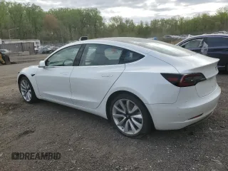 2018 Tesla Model 3 Long Range Battery with VIN 5YJ3E1EAXJF165000, listed as a Copart auction lot 53806195 with 140,448 mi miles and Clean Title. Bid and sale history available at DreamBid. Image 2.