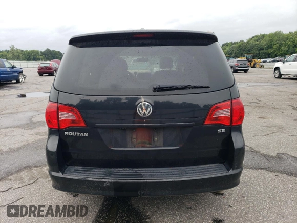2014 Volkswagen Routan SE z VIN 2C4RVABG1ER134621, wystawiony jako Copart lot #61339414 z przebiegiem 153 364 mil mil oraz Szkoda całkowita • Salvage title. Historia ofert i sprzedaży dostępna na DreamBid. Obrazek 6.
