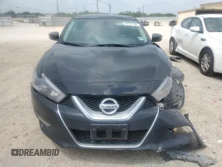 2016 Nissan Maxima SL with VIN 1N4AA6AP7GC384776, listed as a Copart auction lot 54777145 with 107,140 mi miles and Salvage title. Bid and sale history available at DreamBid. Image 5.