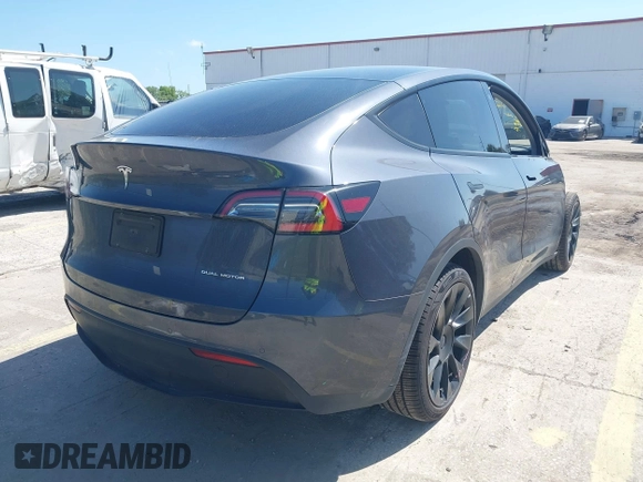 2021 Tesla Model Y Long Range with VIN 5YJYGDEE4MF076791, listed as a IAAI auction lot 41945750 with Not Provided miles and . Bid and sale history available at DreamBid. Image 4.