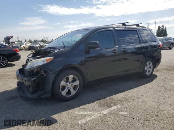 2015 Toyota Sienna LE AAS with VIN 5TDKK3DC8FS610940, listed as a Copart auction lot 47390285 with 128,893 mi miles and Salvage Title. Bid and sale history available at carsss.com. Image 1.