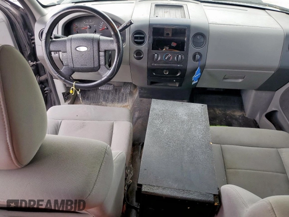 2007 Ford F-150 STX с VIN 1FTRX12W87NA43184, выставлен на аукционе Copart как лот 62112925 с пробегом 210 369 миль миль и Списание • Salvage title. История ставок и продаж доступна на DreamBid. Изображение 8.