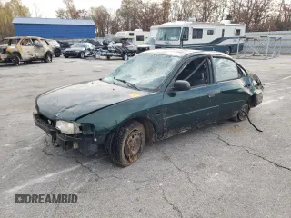 2001 Mitsubishi Mirage ES z VIN JA3AY26C31U045338, wystawiony jako Copart lot #79622544 z przebiegiem Nie podano mil oraz Szkoda całkowita • Salvage title. Historia ofert i sprzedaży dostępna na DreamBid. Obrazek 1.