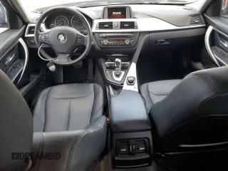 2014 BMW 3 Series 320i xDrive with VIN WBA3C3G51ENS72023, listed as a Copart auction lot 58595225 with 104,315 mi miles and Salvage title. Bid and sale history available at DreamBid. Image 8.