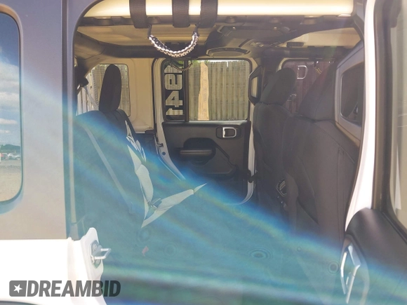 2021 Jeep Wrangler Unlimited Willys с VIN 1C4HJXDN6MW527896, выставлен на аукционе IAAI как лот 42289722 с пробегом 76 800 миль миль и . История ставок и продаж доступна на DreamBid. Изображение 8.