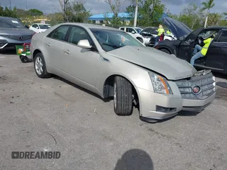 2008 Cadillac CTS AWD w/1SA with VIN 1G6DG577280155483, listed as a IAAI auction lot 41723609 with 132,756 mi miles. Bid and sale history available at carsss.com. Image 1.