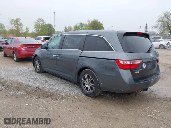 2013 Honda Odyssey EX z VIN 5FNRL5H47DB032096, wystawiony jako IAAI lot #42149190 z przebiegiem 149 836 mil mil oraz . Historia ofert i sprzedaży dostępna na DreamBid. Obrazek 3.
