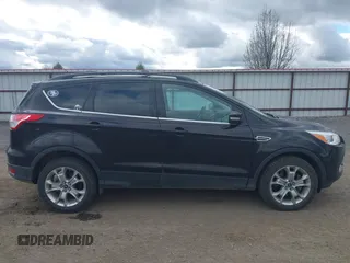 2013 Ford Escape SEL with VIN 1FMCU9H99DUA94169, listed as a IAAI auction lot 41937675 with 106,405 mi miles. Bid and sale history available at carsss.com. Image 14.