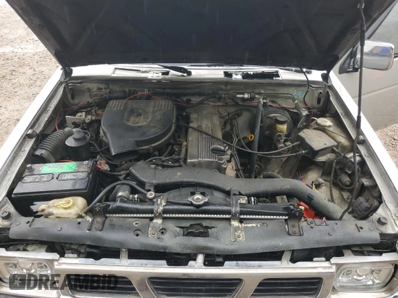 1996 Nissan Frontier XE с VIN 1N6SD16SXTC308255, выставлен на аукционе Copart как лот 53027865 с пробегом 299 424 миль миль и Чистый • Clean title. История ставок и продаж доступна на DreamBid. Изображение 11.