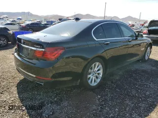 2015 BMW 7 Series 740i with VIN WBAYA6C5XFD826895, listed as a Copart auction lot 66889794 with Not Provided miles and Salvage Title. Bid and sale history available at DreamBid. Image 3.