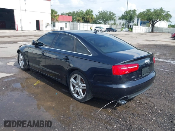 2014 Audi A6 Premium Plus with VIN WAUDFAFC7EN052529, listed as a IAAI auction lot 42667659 with 143,668 mi miles and . Bid and sale history available at DreamBid. Image 3.