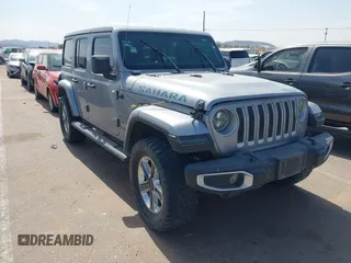 2021 Jeep Wrangler Unlimited Sahara z VIN 1C4HJXEN5MW653567, wystawiony jako IAAI lot #42371300 z przebiegiem Nie podano mil oraz . Historia ofert i sprzedaży dostępna na DreamBid. Obrazek 1.