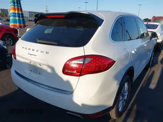 2014 Porsche Cayenne with VIN WP1AA2A28ELA96123, listed as a IAAI auction lot 42010456 with 154,312 mi miles and . Bid and sale history available at DreamBid. Image 4.