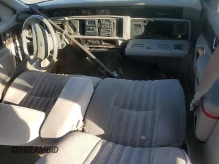 1993 Buick Regal Custom с VIN 2G4WB54L0P1415898, выставлен на аукционе Copart как лот 76933634 с пробегом 94 951 миль миль и Чистый • Clean title. История ставок и продаж доступна на DreamBid. Изображение 8.