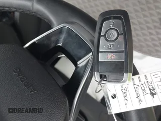 2022 Ford Escape SE with VIN 1FMCU0G6XNUB18144, listed as a IAAI auction lot 42390521 with 27,594 mi miles and . Bid and sale history available at DreamBid. Image 11.