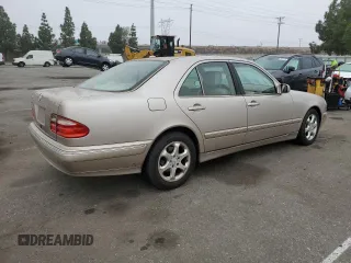 2002 Mercedes-Benz E-Class with VIN WDBJF65J92B404315, listed as a Copart auction lot 75481094 with 87,383 mi miles and Salvage Title. Bid and sale history available at carsss.com. Image 3.