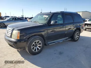 2003 Cadillac Escalade z VIN 1GYEC63T63R317510, wystawiony jako Copart lot #48515195 z przebiegiem 398 303 mil mil oraz Czysty tytuł • Clean title. Historia ofert i sprzedaży dostępna na DreamBid. Obrazek 1.