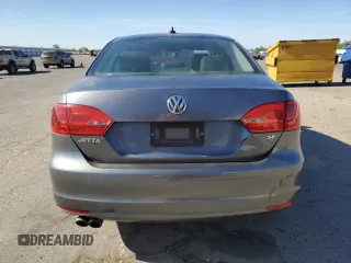 2014 Volkswagen Jetta SE with VIN 3VWD07AJXEM315231, listed as a Copart auction lot 58258075 with 99,860 mi miles and Salvage title. Bid and sale history available at DreamBid. Image 6.