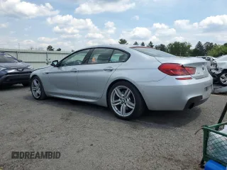 2015 BMW 6 Series 640i xDrive z VIN WBA6B8C53FD453229, wystawiony jako Copart lot #60371214 z przebiegiem 116 624 mil mil oraz Szkoda całkowita • Salvage title. Historia ofert i sprzedaży dostępna na DreamBid. Obrazek 2.