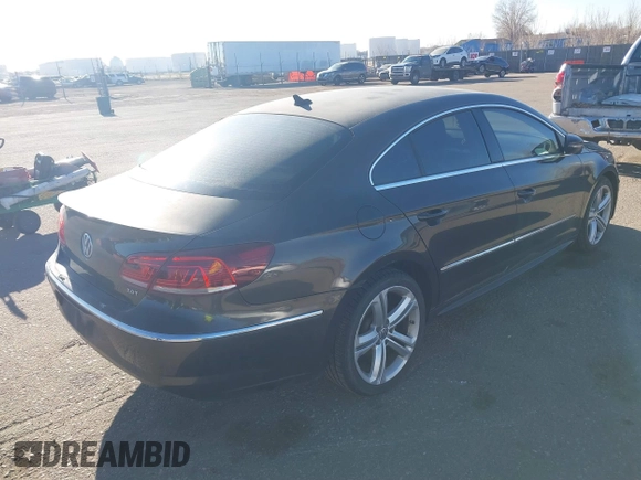 2014 Volkswagen CC Sport with VIN WVWBP7AN7EE514221, listed as a IAAI auction lot 41528930 with 140,227 mi miles and . Bid and sale history available at DreamBid. Image 4.