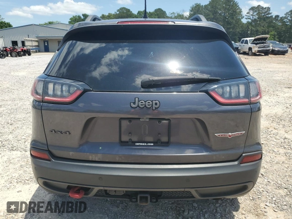 2019 Jeep Cherokee Trailhawk с VIN 1C4PJMBX5KD278692, выставлен на аукционе Copart как лот 56912285 с пробегом 110 964 миль миль и Списание • Salvage title. История ставок и продаж доступна на DreamBid. Изображение 6.