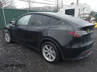 2023 Tesla Model Y Long Range with VIN 7SAYGDEEXPA121625, listed as a IAAI auction lot 41959524 with Not Provided miles and . Bid and sale history available at carsss.com. Image 3.