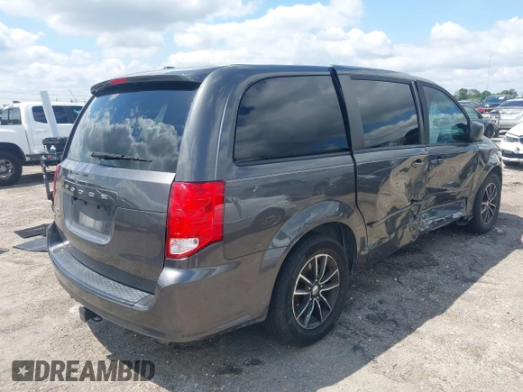 2015 Dodge Grand Caravan American Value with VIN 2C4RDGBGXFR682995, listed as a IAAI auction lot 41994708 with 142,725 mi miles and . Bid and sale history available at DreamBid. Image 4.