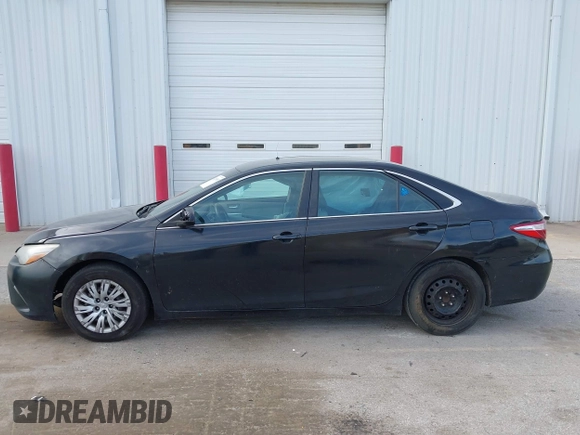 2015 Toyota Camry LE with VIN 4T1BD1FK6FU157623, listed as a IAAI auction lot 42015005 with 300,974 mi miles and . Bid and sale history available at DreamBid. Image 15.