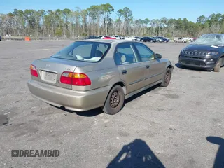 2000 Honda Civic LX with VIN 1HGEJ6577YL022486, listed as a IAAI auction lot 41786438 with 173,488 mi miles and . Bid and sale history available at DreamBid. Image 4.