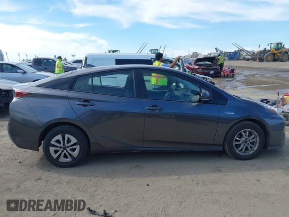 2016 Toyota Prius Four z VIN JTDKARFU2G3022031, wystawiony jako IAAI lot #41631802 z przebiegiem 151 389 mil mil oraz . Historia ofert i sprzedaży dostępna na DreamBid. Obrazek 13.