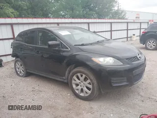 2009 Mazda CX-7 Sport z VIN JM3ER29L790220891, wystawiony jako IAAI lot #42039399 z przebiegiem 128 156 mil mil oraz . Historia ofert i sprzedaży dostępna na DreamBid. Obrazek 1.