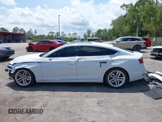 2019 Audi A5 Sportback Premium z VIN WAUANCF56KA080411, wystawiony jako IAAI lot #42208539 z przebiegiem 131 690 mil mil oraz . Historia ofert i sprzedaży dostępna na DreamBid. Obrazek 15.