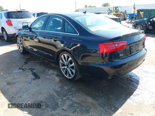 2013 Audi A6 Premium Plus with VIN WAUGGAFC7DN155006, listed as a IAAI auction lot 42535357 with 163,235 mi miles and . Bid and sale history available at DreamBid. Image 3.