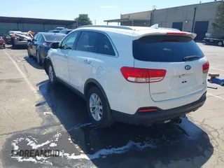 2017 Kia Sorento LX with VIN 5XYPGDA59HG307040, listed as a IAAI auction lot 42125920 with 125,303 mi miles and . Bid and sale history available at carsss.com. Image 3.
