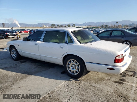 2001 Jaguar XJ with VIN SAJDA23C51LF35586, listed as a Copart auction lot 44105165 with 47,355 mi miles and Salvage title. Bid and sale history available at DreamBid. Image 2.