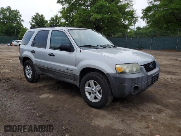 2005 Ford Escape Hybrid with VIN 1FMCU96H55KC74059, listed as a Copart auction lot 57065685 with 154,807 mi miles and Salvage title. Bid and sale history available at DreamBid. Image 4.