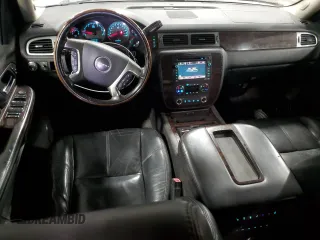 2007 GMC Yukon Denali z VIN 1GKFK638X7J151025, wystawiony jako Copart lot #57663755 z przebiegiem 229 754 mil mil oraz Tytuł czysty. Historia ofert i sprzedaży dostępna na DreamBid. Obrazek 8.