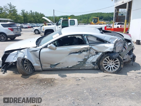 2014 Cadillac CTS Performance with VIN 1G6DG1E35E0107139, listed as a IAAI auction lot 42371034 with 56,988 mi miles and . Bid and sale history available at DreamBid. Image 15.