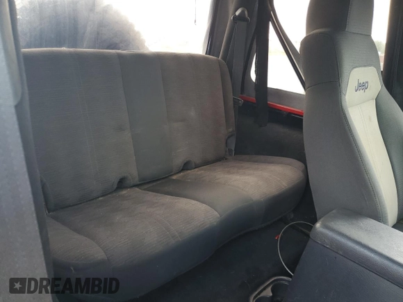 2004 Jeep Wrangler X с VIN 1J4FA39SX4P790444, выставлен на аукционе Copart как лот 56385635 с пробегом 195 355 миль миль и Списание • Salvage title. История ставок и продаж доступна на DreamBid. Изображение 11.
