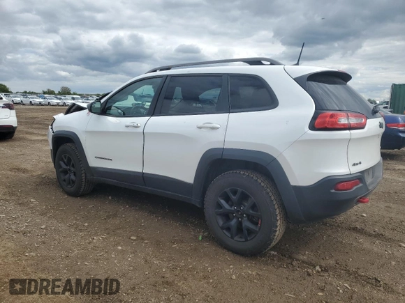 2016 Jeep Cherokee Trailhawk with VIN 1C4PJMBS8GW359461, listed as a Copart auction lot 57950705 with 146,124 mi miles and Salvage title. Bid and sale history available at DreamBid. Image 2.